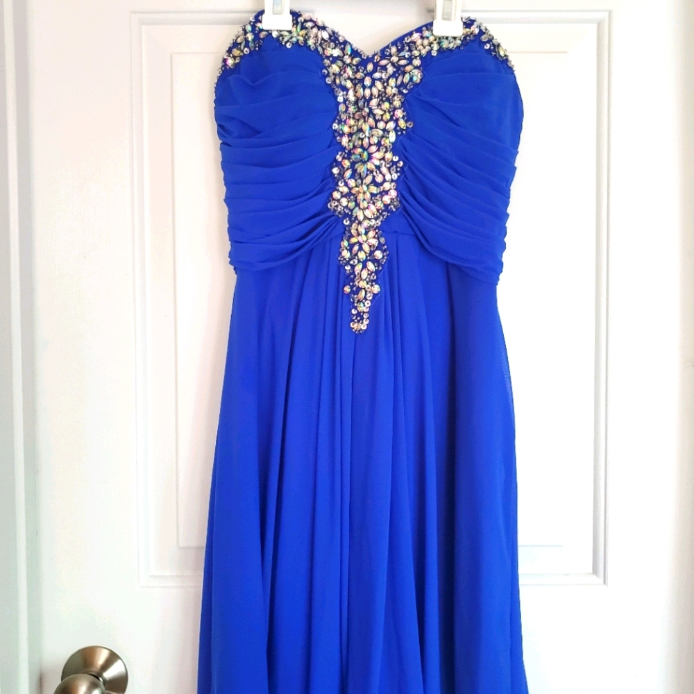 A knee length strapless blue dress